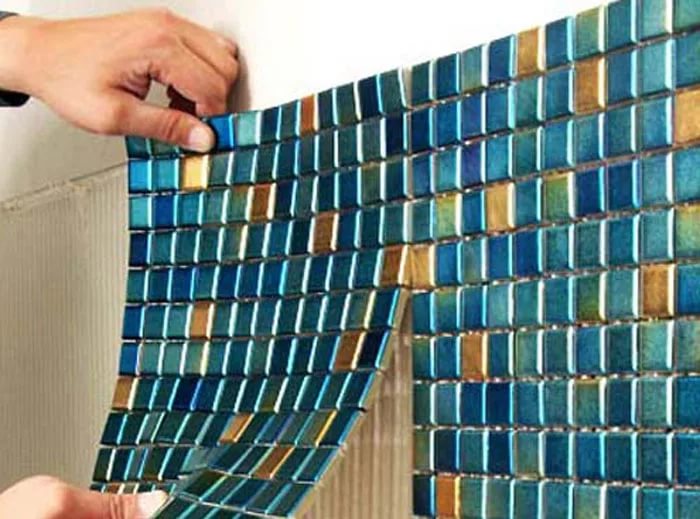 white iridescent tile backsplash