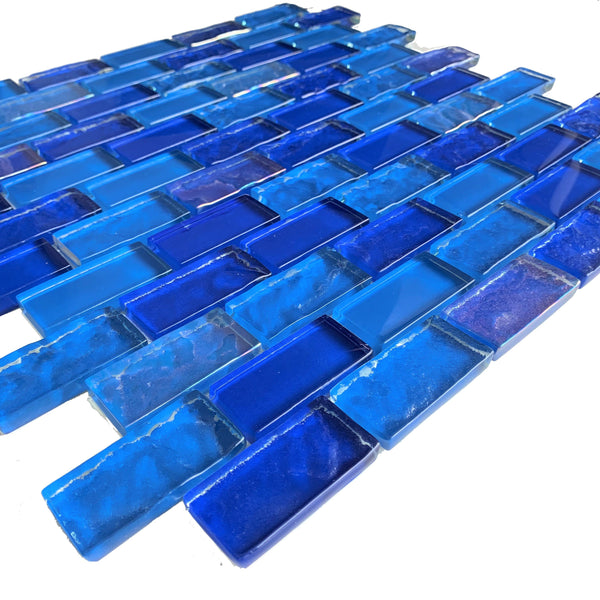 Deep Ocean 1x2 Glass tile is a perfect mix of Tropical Blues mixed with different patterns to create different patterns.  - Tiles and Deco